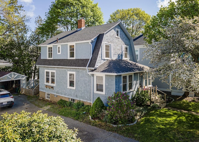 15 Federal St, Bar Harbor, ME 04609 - view of side of property with roof with shingles, a chimney, and a gambrel roof