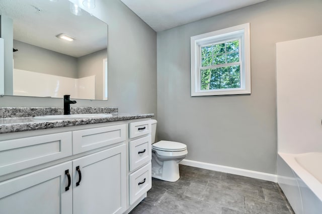 LOT10 Laney Ln, Wells, ME 04090 - full bathroom featuring baseboards, toilet, vanity, a tub to relax in, and a shower