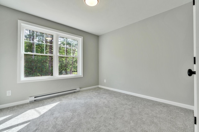 LOT10 Laney Ln, Wells, ME 04090 - empty room with a baseboard radiator, carpet flooring, and baseboards