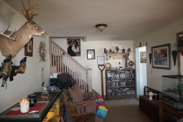 1003-1005 Main St, Vassalboro, ME 04989 - living area with stairs and carpet flooring