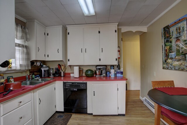 532 Main St, South Portland, ME 04106 - kitchen featuring dishwasher, a sink, white cabinets, light wood-style flooring, and crown molding