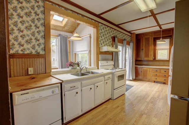 532 Main St, South Portland, ME 04106 - kitchen with white appliances, wallpapered walls, a sink, a skylight, and open shelves