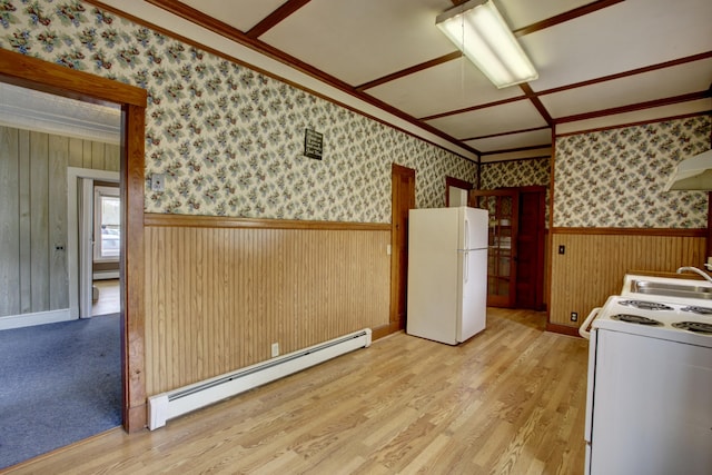 532 Main St, South Portland, ME 04106 - kitchen with white appliances, baseboard heating, a sink, wainscoting, and wallpapered walls