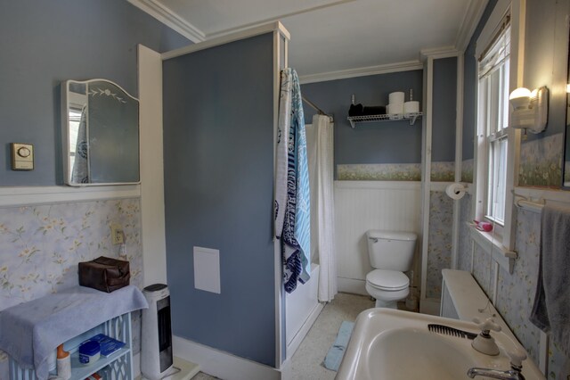 532 Main St, South Portland, ME 04106 - bathroom featuring wainscoting, a sink, toilet, crown molding, and shower / tub combo