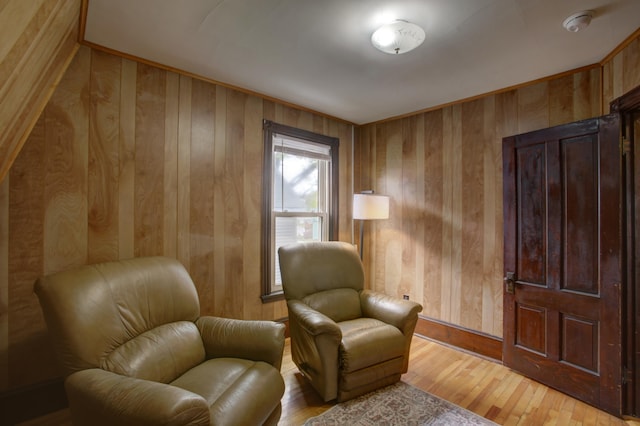 532 Main St, South Portland, ME 04106 - sitting room with wooden walls and hardwood / wood-style flooring