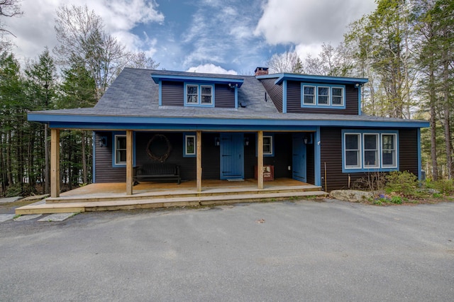 25 Winds Way Dr, Nobleboro, ME 04555 - view of front of property featuring covered porch and a chimney