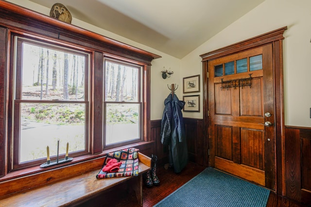 25 Winds Way Dr, Nobleboro, ME 04555 - foyer entrance featuring lofted ceiling, a wainscoted wall, healthy amount of natural light, wood finished floors, and wooden walls