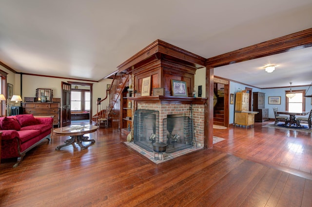 25 Winds Way Dr, Nobleboro, ME 04555 - living area with stairs, ornamental molding, hardwood / wood-style flooring, and a fireplace