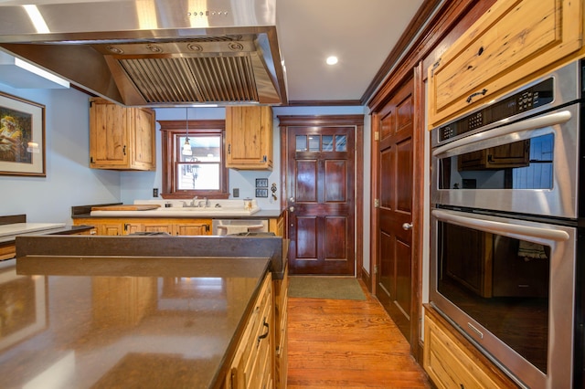25 Winds Way Dr, Nobleboro, ME 04555 - kitchen with stainless steel appliances, range hood, wood finished floors, a sink, and recessed lighting