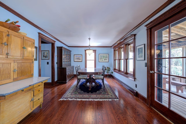 25 Winds Way Dr, Nobleboro, ME 04555 - dining room featuring baseboards, dark wood-style floors, and crown molding