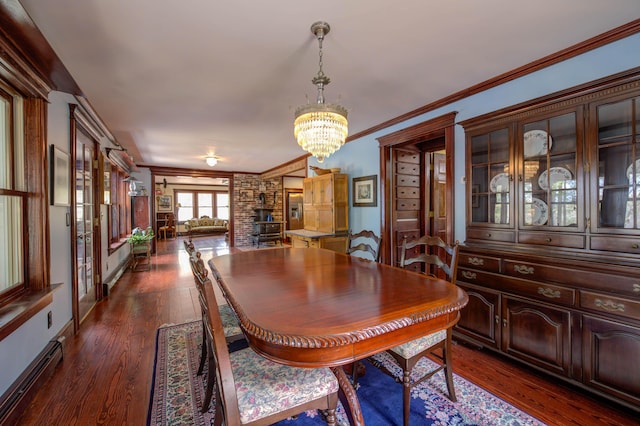 25 Winds Way Dr, Nobleboro, ME 04555 - dining room featuring a chandelier, dark wood-style flooring, and ornamental molding