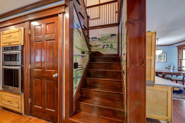 25 Winds Way Dr, Nobleboro, ME 04555 - stairs with crown molding and wood finished floors