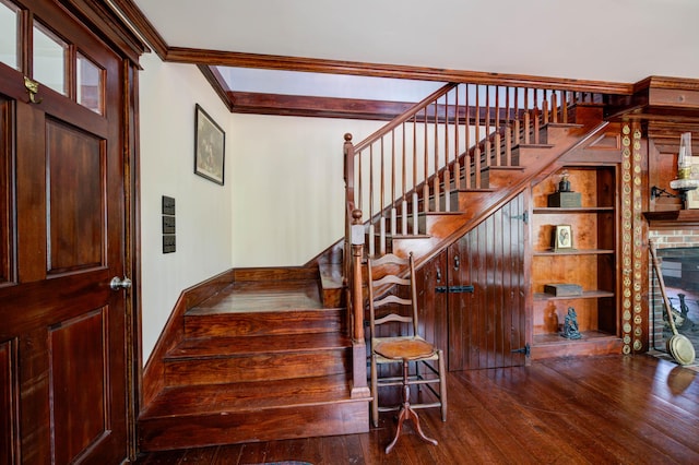 25 Winds Way Dr, Nobleboro, ME 04555 - stairway featuring hardwood / wood-style flooring, ornamental molding, built in features, and baseboards