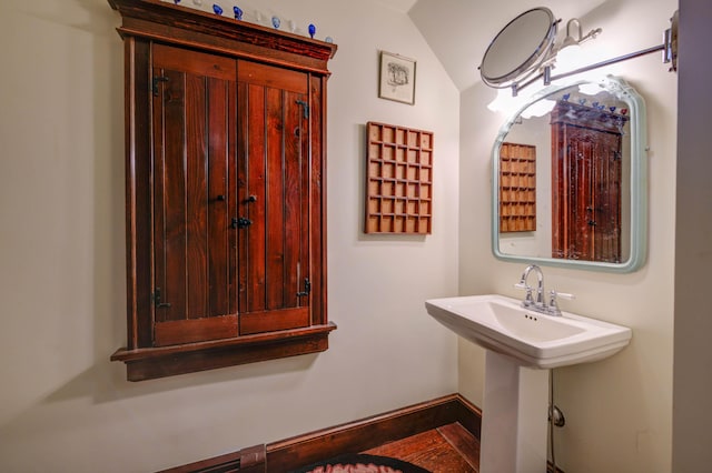 25 Winds Way Dr, Nobleboro, ME 04555 - bathroom featuring lofted ceiling and baseboards