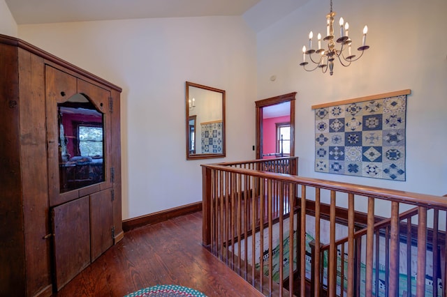 25 Winds Way Dr, Nobleboro, ME 04555 - corridor with an upstairs landing, wood finished floors, a chandelier, plenty of natural light, and high vaulted ceiling