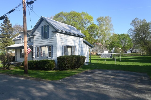 40 Baker St, Bingham, ME 04920 - view of property exterior featuring a yard