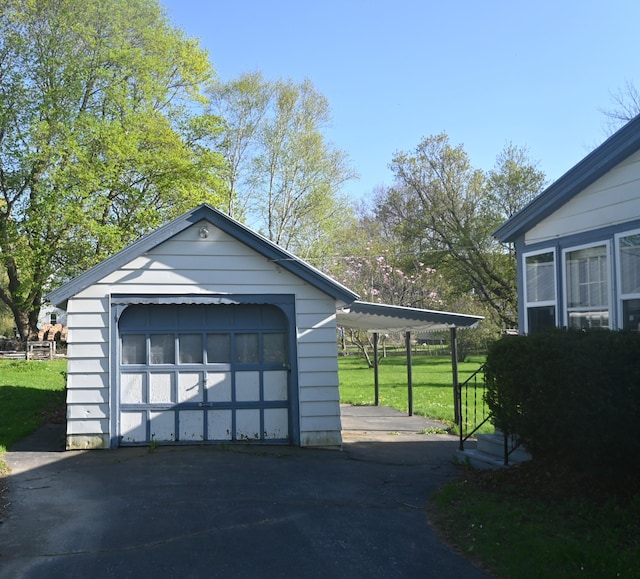 40 Baker St, Bingham, ME 04920 - detached garage with asphalt driveway