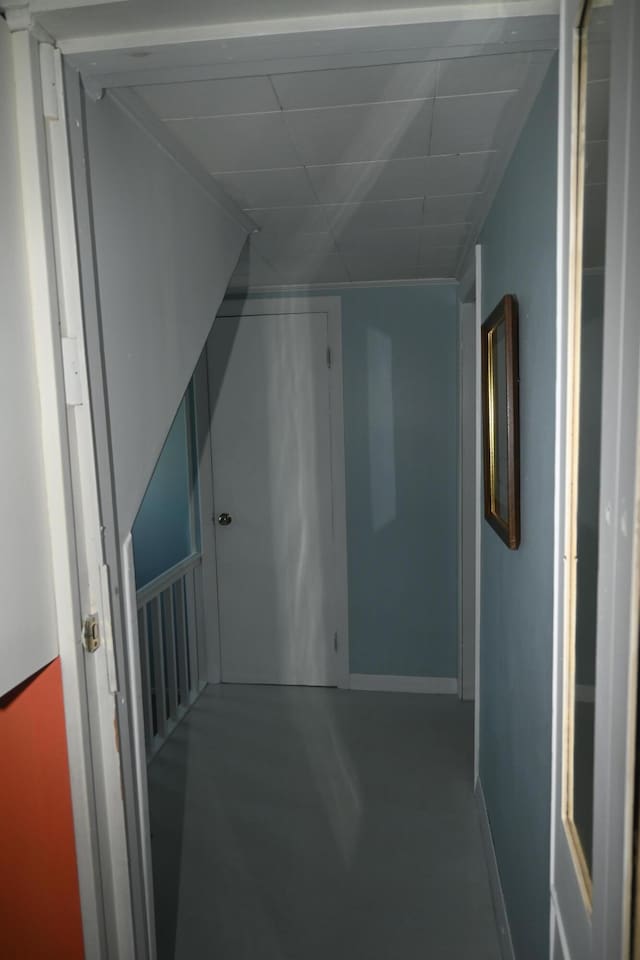 40 Baker St, Bingham, ME 04920 - hallway featuring concrete floors and baseboards