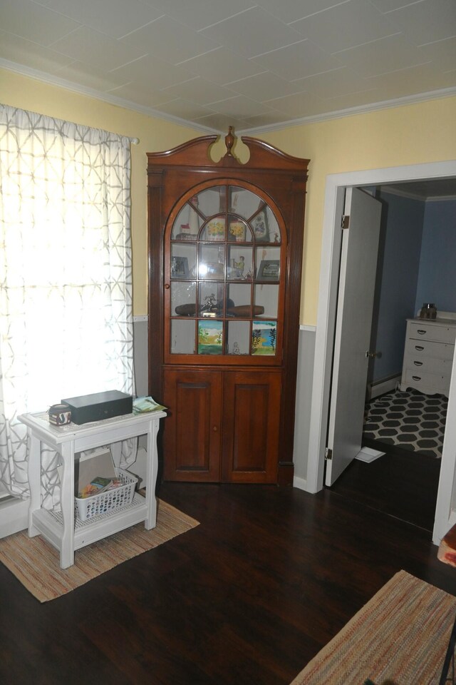 40 Baker St, Bingham, ME 04920 - foyer entrance featuring wood finished floors, ornamental molding, and wainscoting