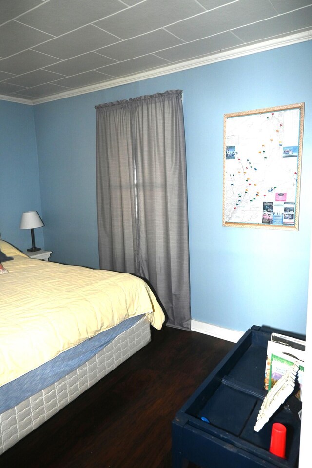 40 Baker St, Bingham, ME 04920 - bedroom with ornamental molding, wood finished floors, and baseboards