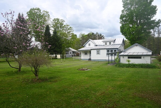 40 Baker St, Bingham, ME 04920 - view of yard featuring an outdoor fire pit