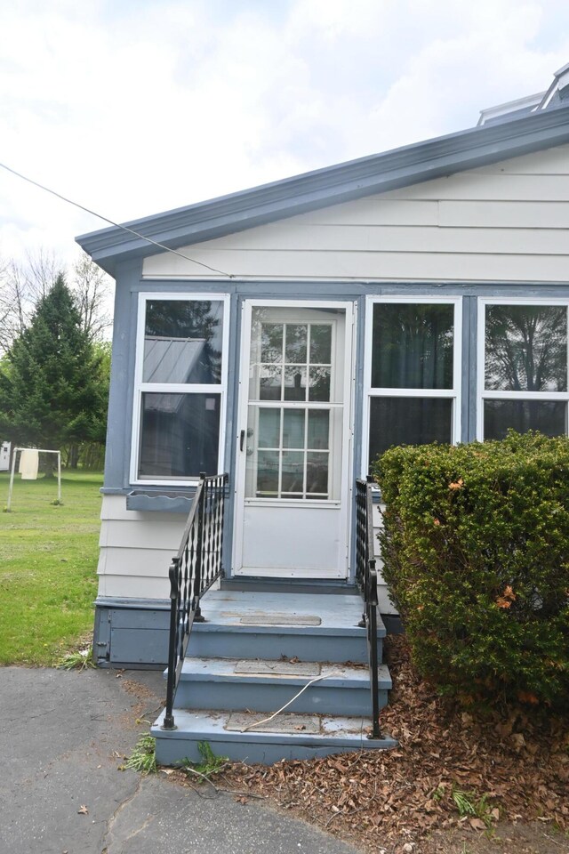 40 Baker St, Bingham, ME 04920 - property entrance featuring a yard