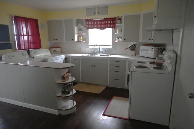 40 Baker St, Bingham, ME 04920 - kitchen with open shelves, white appliances, a sink, washer and dryer, and ventilation hood