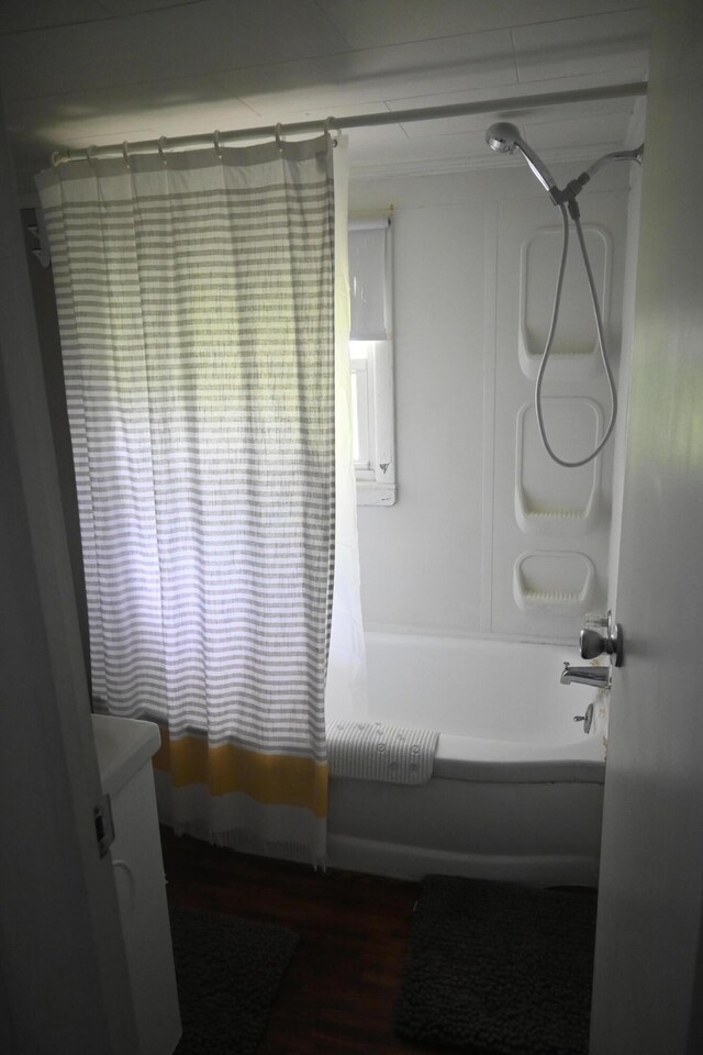 40 Baker St, Bingham, ME 04920 - full bathroom with wood finished floors, shower / bath combo, and vanity