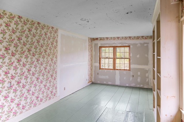 691 N Rd, Parsonsfield, ME 04047 - empty room featuring wallpapered walls and wood finished floors