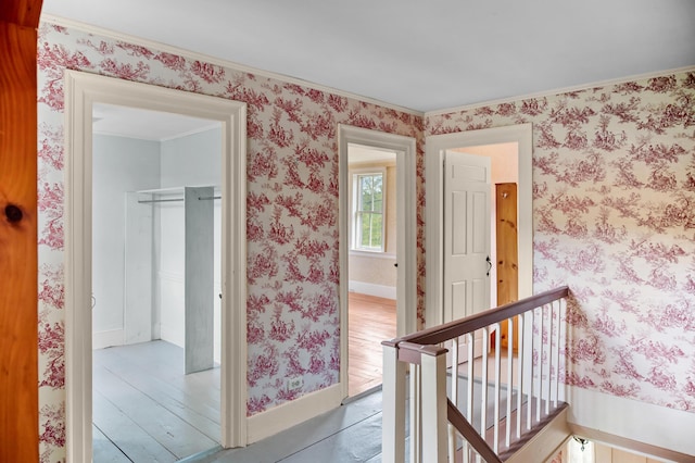 691 N Rd, Parsonsfield, ME 04047 - hall with an upstairs landing, baseboards, wallpapered walls, ornamental molding, and wood finished floors