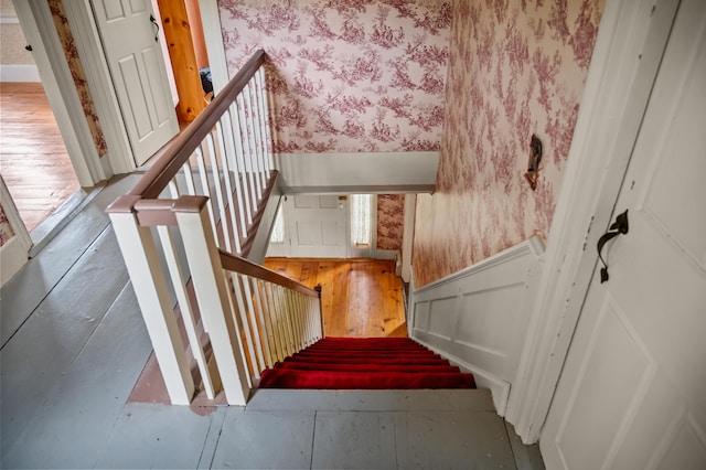 691 N Rd, Parsonsfield, ME 04047 - staircase featuring wallpapered walls and wainscoting
