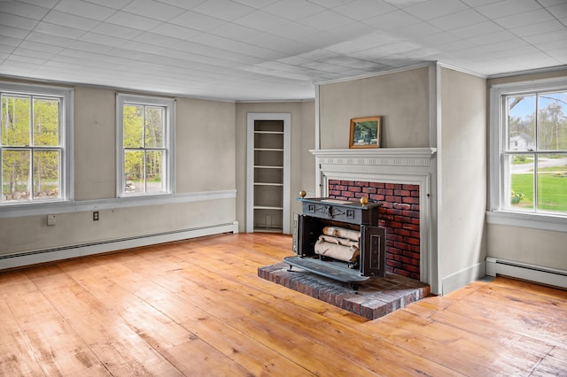 691 N Rd, Parsonsfield, ME 04047 - living room with a baseboard heating unit, hardwood / wood-style floors, and ornamental molding