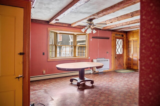 691 N Rd, Parsonsfield, ME 04047 - unfurnished dining area with heating unit, beam ceiling, a baseboard heating unit, and ceiling fan