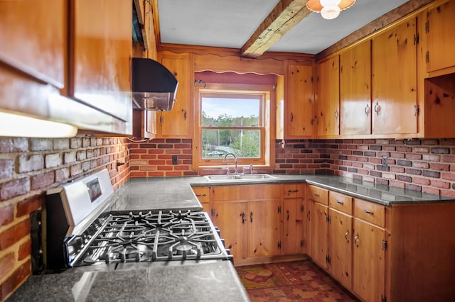 691 N Rd, Parsonsfield, ME 04047 - kitchen with gas stove, a sink, exhaust hood, beamed ceiling, and brown cabinets
