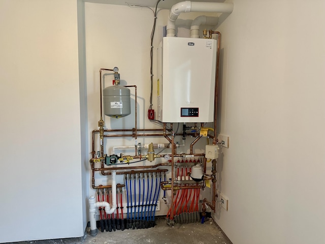 utility room with water heater