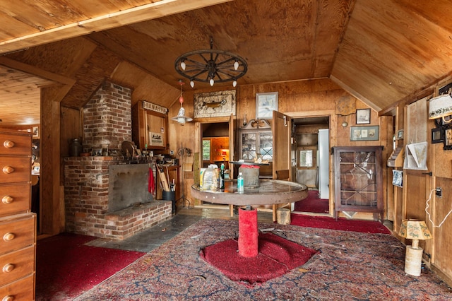 12 York Ln, Dallas Plt, ME 04970 - entrance foyer with wood ceiling, vaulted ceiling, wooden walls, and a fireplace