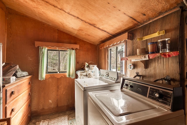 12 York Ln, Dallas Plt, ME 04970 - laundry room with healthy amount of natural light, washer and clothes dryer, and wood walls