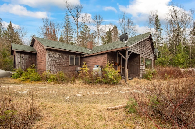 12 York Ln, Dallas Plt, ME 04970 - view of front of property featuring a chimney