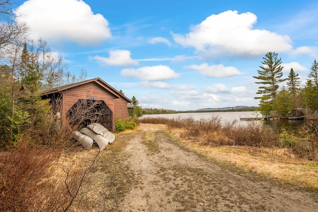 12 York Ln, Dallas Plt, ME 04970 - view of dirt / gravel road with a water view
