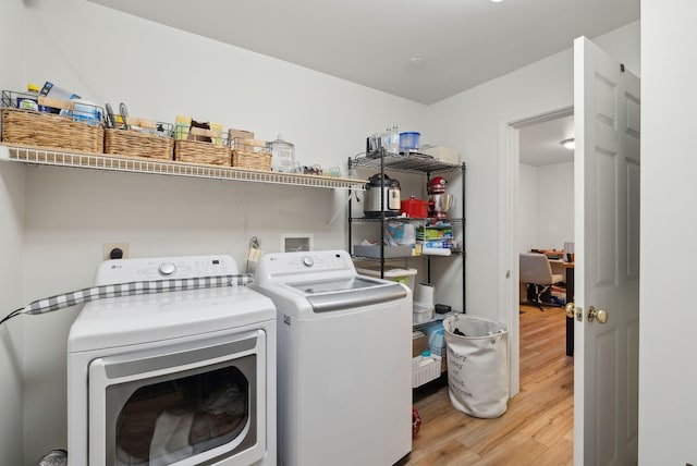 10 Hornet St Unit 10, Brunswick, ME 04011 - laundry room with washer and clothes dryer and light wood-type flooring