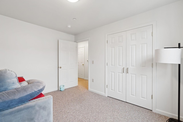 10 Hornet St Unit 10, Brunswick, ME 04011 - sitting room with carpet floors and baseboards