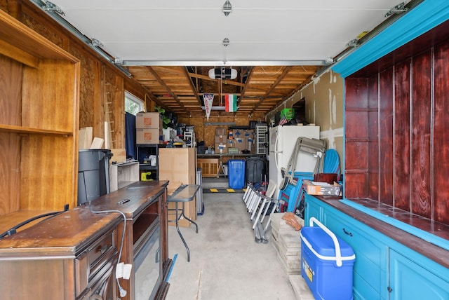 10 Hornet St Unit 10, Brunswick, ME 04011 - garage with a garage door opener