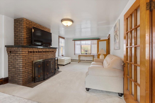 carpeted living room featuring a fireplace and baseboard heating