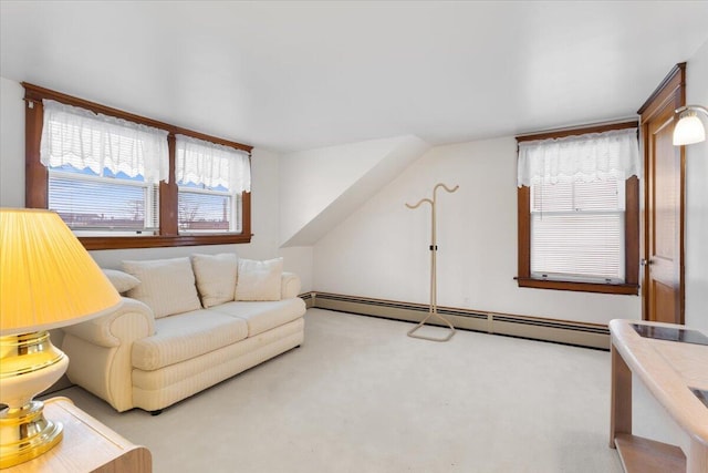 living room with a baseboard radiator and carpet flooring