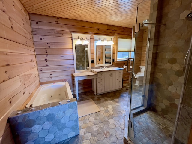 869 Turkey Tail Rd Unit T4, Indian Purchase Twp, ME 04462 - bathroom featuring a stall shower, a whirlpool tub, wood ceiling, wood walls, and vanity