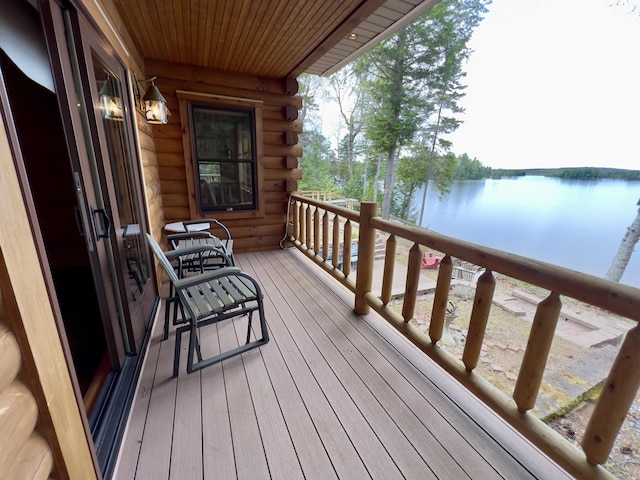 869 Turkey Tail Rd Unit T4, Indian Purchase Twp, ME 04462 - wooden deck with a water view