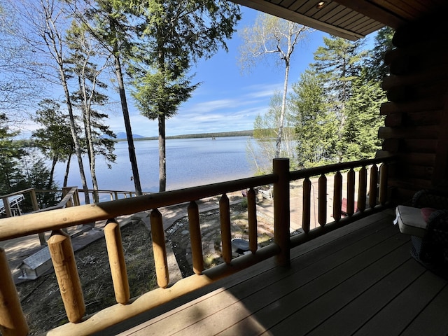 869 Turkey Tail Rd Unit T4, Indian Purchase Twp, ME 04462 - wooden terrace with a water view