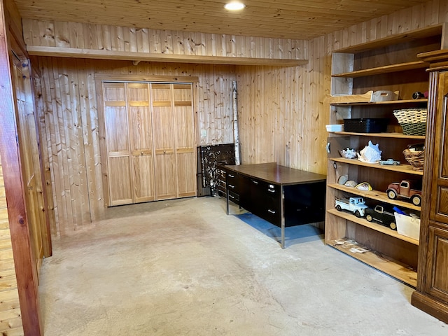 869 Turkey Tail Rd Unit T4, Indian Purchase Twp, ME 04462 - interior space with concrete flooring and wood walls