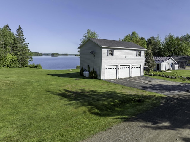 1824 Sunny Cove Ln, Meddybemps, ME 04657 - garage featuring a water view and driveway