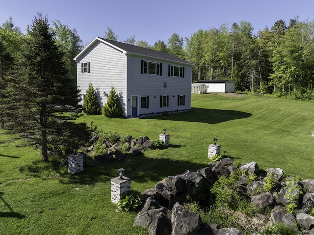 1824 Sunny Cove Ln, Meddybemps, ME 04657 - view of front of house featuring a front yard and an outbuilding